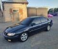 Синий Опель Омега, объемом двигателя 2.5 л и пробегом 250 тыс. км за 2800 $, фото 1 на Automoto.ua