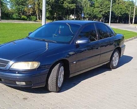 Синий Опель Омега, объемом двигателя 2.2 л и пробегом 350 тыс. км за 3100 $, фото 3 на Automoto.ua