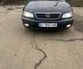 Синий Опель Омега, объемом двигателя 2.2 л и пробегом 343 тыс. км за 2000 $, фото 2 на Automoto.ua