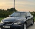 Синий Опель Омега, объемом двигателя 2.2 л и пробегом 318 тыс. км за 1958 $, фото 1 на Automoto.ua