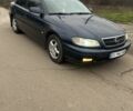 Синий Опель Омега, объемом двигателя 2.2 л и пробегом 343 тыс. км за 2000 $, фото 1 на Automoto.ua