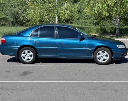 Синий Опель Омега, объемом двигателя 2.2 л и пробегом 113 тыс. км за 3500 $, фото 4 на Automoto.ua