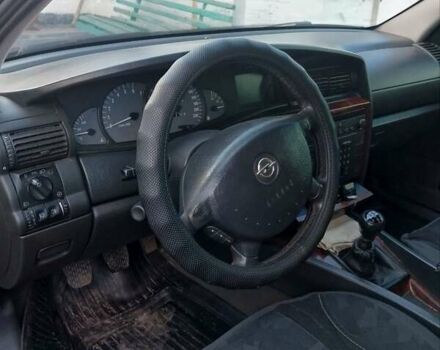 Синий Опель Омега, объемом двигателя 2.2 л и пробегом 290 тыс. км за 4000 $, фото 13 на Automoto.ua