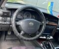 Синий Опель Омега, объемом двигателя 2.2 л и пробегом 260 тыс. км за 2800 $, фото 4 на Automoto.ua