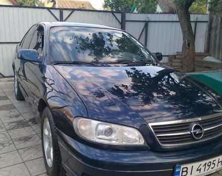 Синий Опель Омега, объемом двигателя 2.2 л и пробегом 290 тыс. км за 4000 $, фото 4 на Automoto.ua