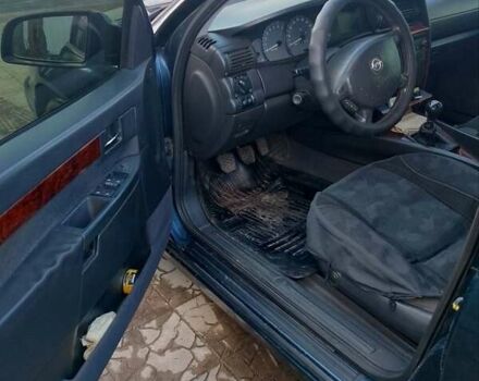 Синий Опель Омега, объемом двигателя 2.2 л и пробегом 290 тыс. км за 4000 $, фото 12 на Automoto.ua