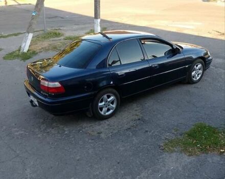 Синий Опель Омега, объемом двигателя 2.2 л и пробегом 290 тыс. км за 4000 $, фото 5 на Automoto.ua