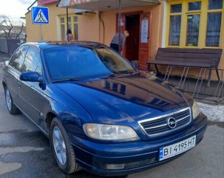 Синий Опель Омега, объемом двигателя 2.2 л и пробегом 290 тыс. км за 4000 $, фото 15 на Automoto.ua