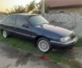 Синий Опель Омега, объемом двигателя 2.4 л и пробегом 350 тыс. км за 600 $, фото 1 на Automoto.ua
