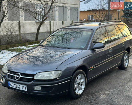 Синий Опель Омега, объемом двигателя 2 л и пробегом 335 тыс. км за 1599 $, фото 19 на Automoto.ua