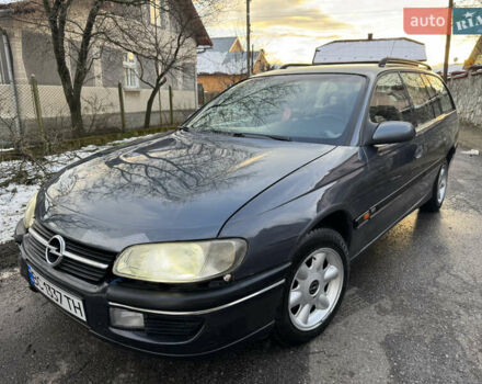 Синий Опель Омега, объемом двигателя 2 л и пробегом 335 тыс. км за 1599 $, фото 1 на Automoto.ua