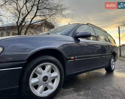 Синий Опель Омега, объемом двигателя 2 л и пробегом 335 тыс. км за 1599 $, фото 18 на Automoto.ua