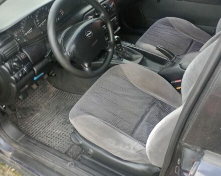 Синий Опель Омега, объемом двигателя 2 л и пробегом 430 тыс. км за 1500 $, фото 4 на Automoto.ua