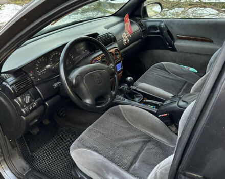 Синий Опель Омега, объемом двигателя 2 л и пробегом 335 тыс. км за 1599 $, фото 22 на Automoto.ua