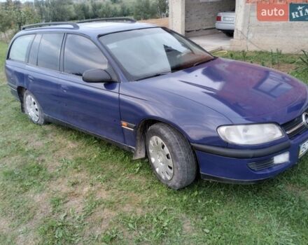 Синій Опель Омега, об'ємом двигуна 2 л та пробігом 306 тис. км за 1500 $, фото 4 на Automoto.ua