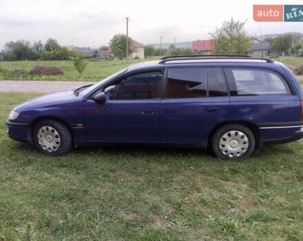 Синій Опель Омега, об'ємом двигуна 2 л та пробігом 306 тис. км за 1950 $, фото 8 на Automoto.ua