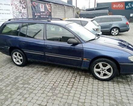 Синий Опель Омега, объемом двигателя 2 л и пробегом 450 тыс. км за 1300 $, фото 3 на Automoto.ua