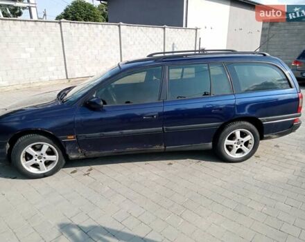 Синий Опель Омега, объемом двигателя 2 л и пробегом 450 тыс. км за 1300 $, фото 1 на Automoto.ua