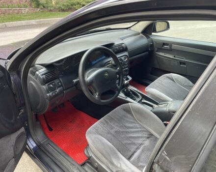 Синий Опель Омега, объемом двигателя 2 л и пробегом 350 тыс. км за 1250 $, фото 7 на Automoto.ua