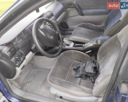 Синій Опель Омега, об'ємом двигуна 2 л та пробігом 306 тис. км за 1950 $, фото 11 на Automoto.ua