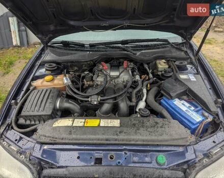 Синий Опель Омега, объемом двигателя 2.5 л и пробегом 400 тыс. км за 2400 $, фото 4 на Automoto.ua