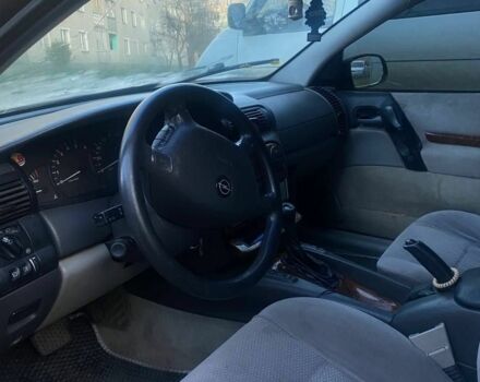 Синий Опель Омега, объемом двигателя 2.5 л и пробегом 312 тыс. км за 1750 $, фото 1 на Automoto.ua
