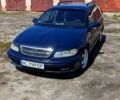 Синий Опель Омега, объемом двигателя 2.2 л и пробегом 368 тыс. км за 1550 $, фото 1 на Automoto.ua