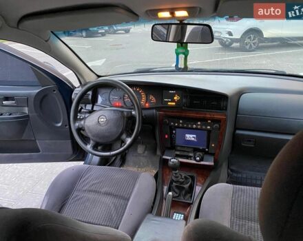 Синій Опель Омега, об'ємом двигуна 2.5 л та пробігом 355 тис. км за 2555 $, фото 18 на Automoto.ua