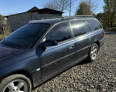 Опель Омега 2003 в Черновцах на Automoto.ua Синий Опель Омега, объемом двигателя 2.17 л и пробегом 300 тыс. км за 3000 $, фото 6 на Automoto.ua