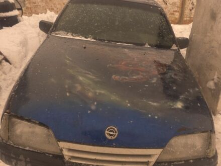 Синий Опель Омега, объемом двигателя 1.8 л и пробегом 350 тыс. км за 466 $, фото 1 на Automoto.ua