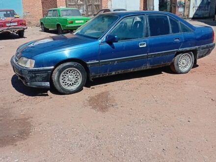 Синий Опель Омега, объемом двигателя 2 л и пробегом 230 тыс. км за 400 $, фото 1 на Automoto.ua