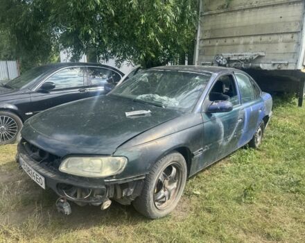 Синий Опель Омега, объемом двигателя 2.5 л и пробегом 333 тыс. км за 700 $, фото 1 на Automoto.ua