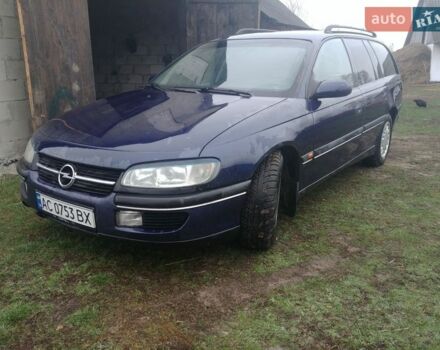 Синий Опель Омега, объемом двигателя 2 л и пробегом 300 тыс. км за 1250 $, фото 1 на Automoto.ua