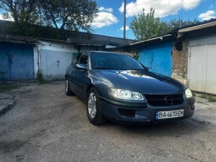 Синий Опель Омега, объемом двигателя 2 л и пробегом 326 тыс. км за 2450 $, фото 1 на Automoto.ua