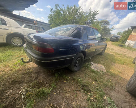 Синий Опель Омега, объемом двигателя 2.5 л и пробегом 333 тыс. км за 700 $, фото 1 на Automoto.ua