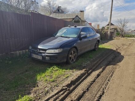 Синий Опель Омега, объемом двигателя 3 л и пробегом 420 тыс. км за 1500 $, фото 1 на Automoto.ua