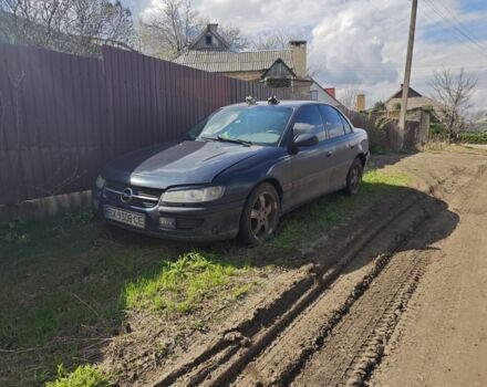 Синий Опель Омега, объемом двигателя 3 л и пробегом 420 тыс. км за 1500 $, фото 1 на Automoto.ua