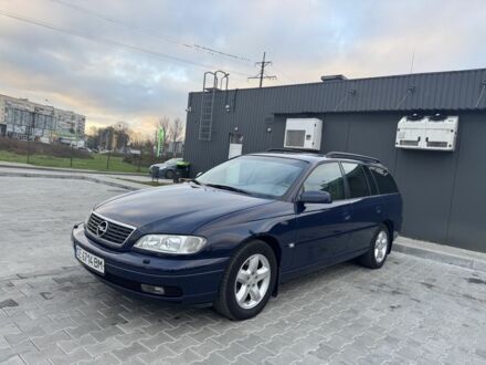 Синий Опель Омега, объемом двигателя 2 л и пробегом 250 тыс. км за 3650 $, фото 1 на Automoto.ua