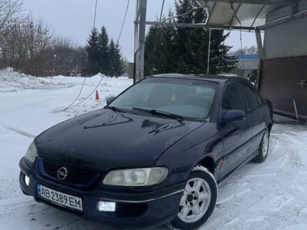 Синий Опель Омега, объемом двигателя 2 л и пробегом 320 тыс. км за 1700 $, фото 1 на Automoto.ua