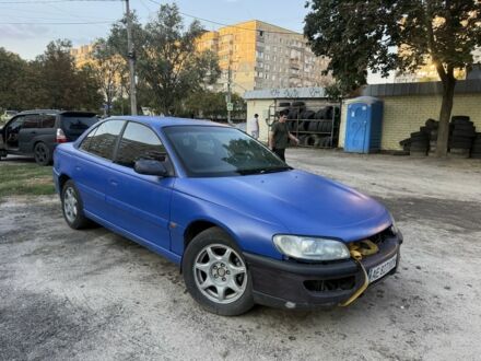 Синий Опель Омега, объемом двигателя 3 л и пробегом 325 тыс. км за 1100 $, фото 1 на Automoto.ua