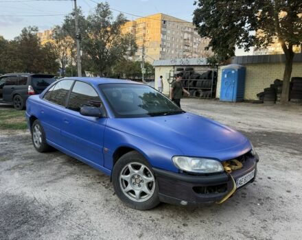 Синий Опель Омега, объемом двигателя 3 л и пробегом 325 тыс. км за 1100 $, фото 1 на Automoto.ua