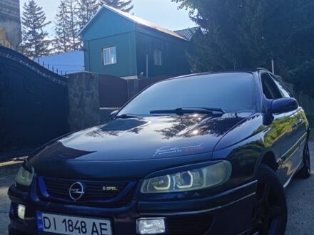 Синій Опель Омега, об'ємом двигуна 2 л та пробігом 329 тис. км за 1701 $, фото 1 на Automoto.ua