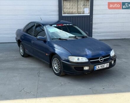 Синий Опель Омега, объемом двигателя 2.5 л и пробегом 300 тыс. км за 1550 $, фото 1 на Automoto.ua