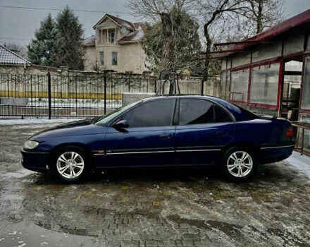 Синий Опель Омега, объемом двигателя 3 л и пробегом 200 тыс. км за 2000 $, фото 1 на Automoto.ua