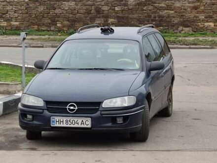 Синий Опель Омега, объемом двигателя 2 л и пробегом 383 тыс. км за 1800 $, фото 1 на Automoto.ua