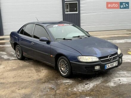 Синий Опель Омега, объемом двигателя 2.5 л и пробегом 300 тыс. км за 1550 $, фото 1 на Automoto.ua