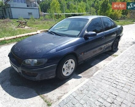 Синий Опель Омега, объемом двигателя 2.5 л и пробегом 350 тыс. км за 1600 $, фото 1 на Automoto.ua