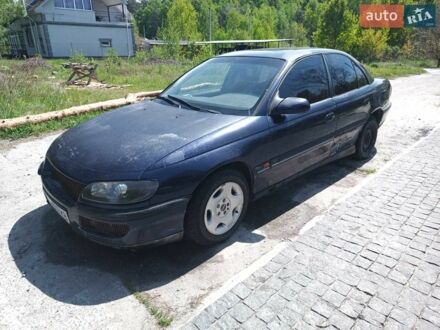 Синий Опель Омега, объемом двигателя 2.5 л и пробегом 350 тыс. км за 1600 $, фото 1 на Automoto.ua