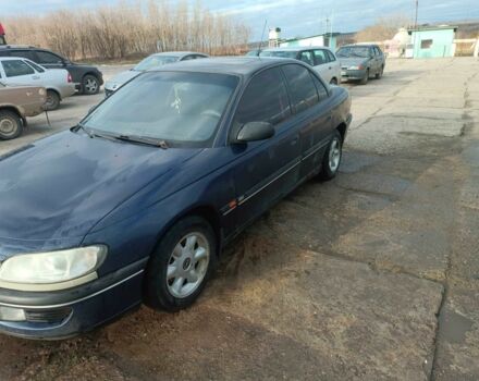 Синий Опель Омега, объемом двигателя 2 л и пробегом 440 тыс. км за 1300 $, фото 1 на Automoto.ua