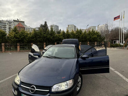 Синий Опель Омега, объемом двигателя 3 л и пробегом 426 тыс. км за 2000 $, фото 1 на Automoto.ua